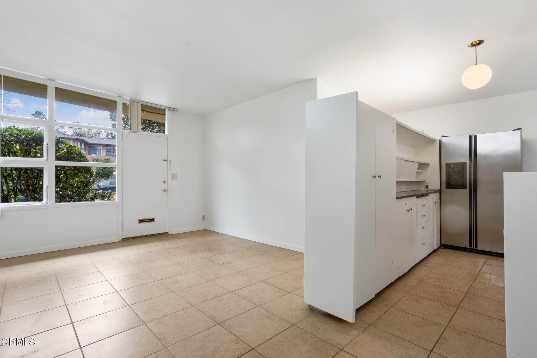 54 Avenue 64 Pasadena, CA 91105 - Photo 11 of 24 a view of a kitchen with a sink and a refrigerator