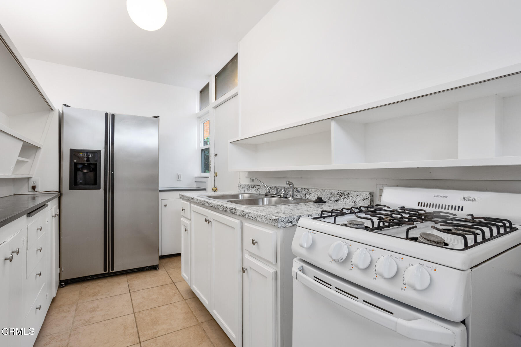 54 Avenue 64 Pasadena, CA 91105 - Photo 14 of 24 a kitchen with stainless steel appliances granite countertop a stove and a refrigerator