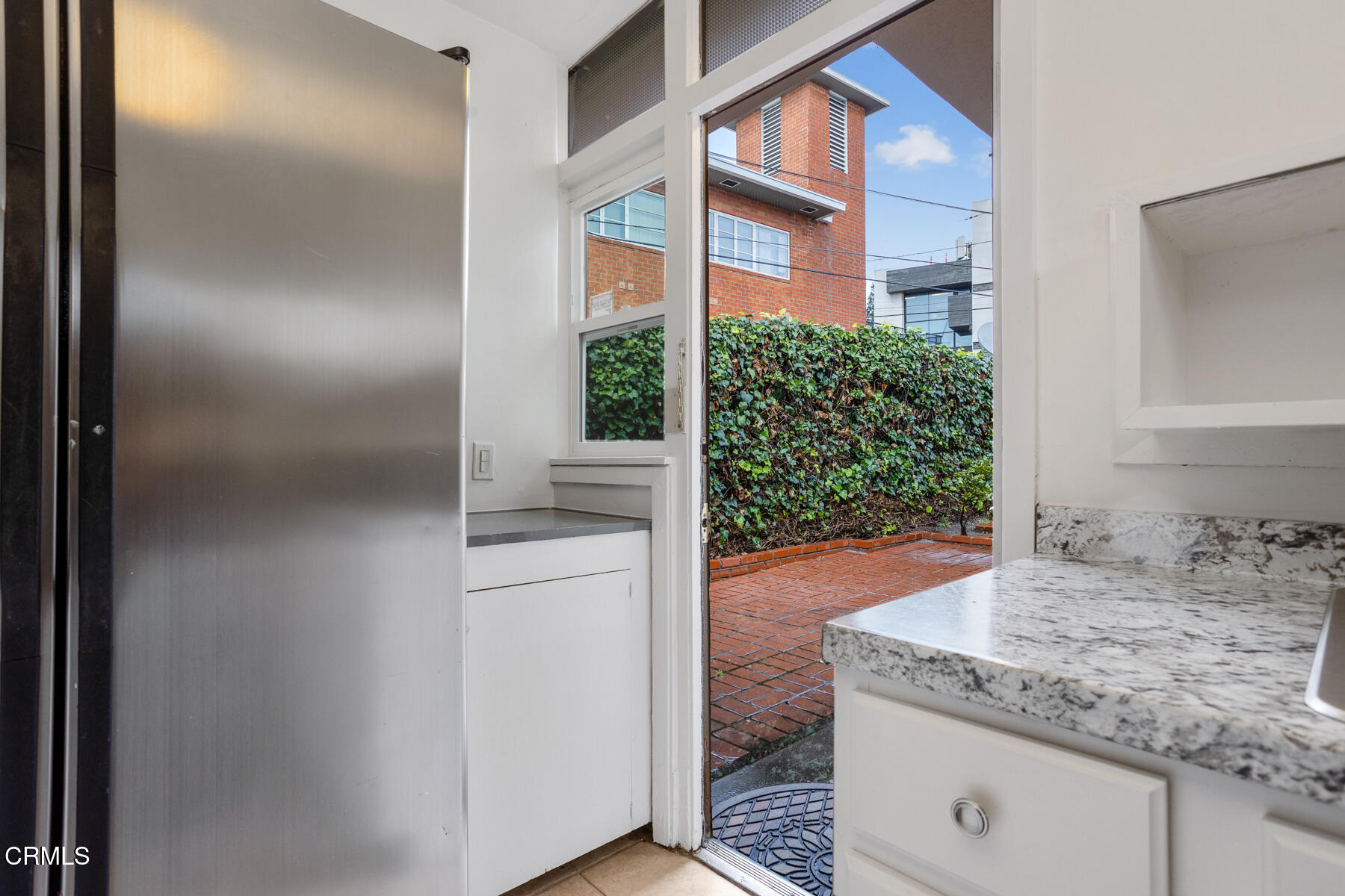 54 Avenue 64 Pasadena, CA 91105 - Photo 16 of 24 a view of a bathroom from a hallway