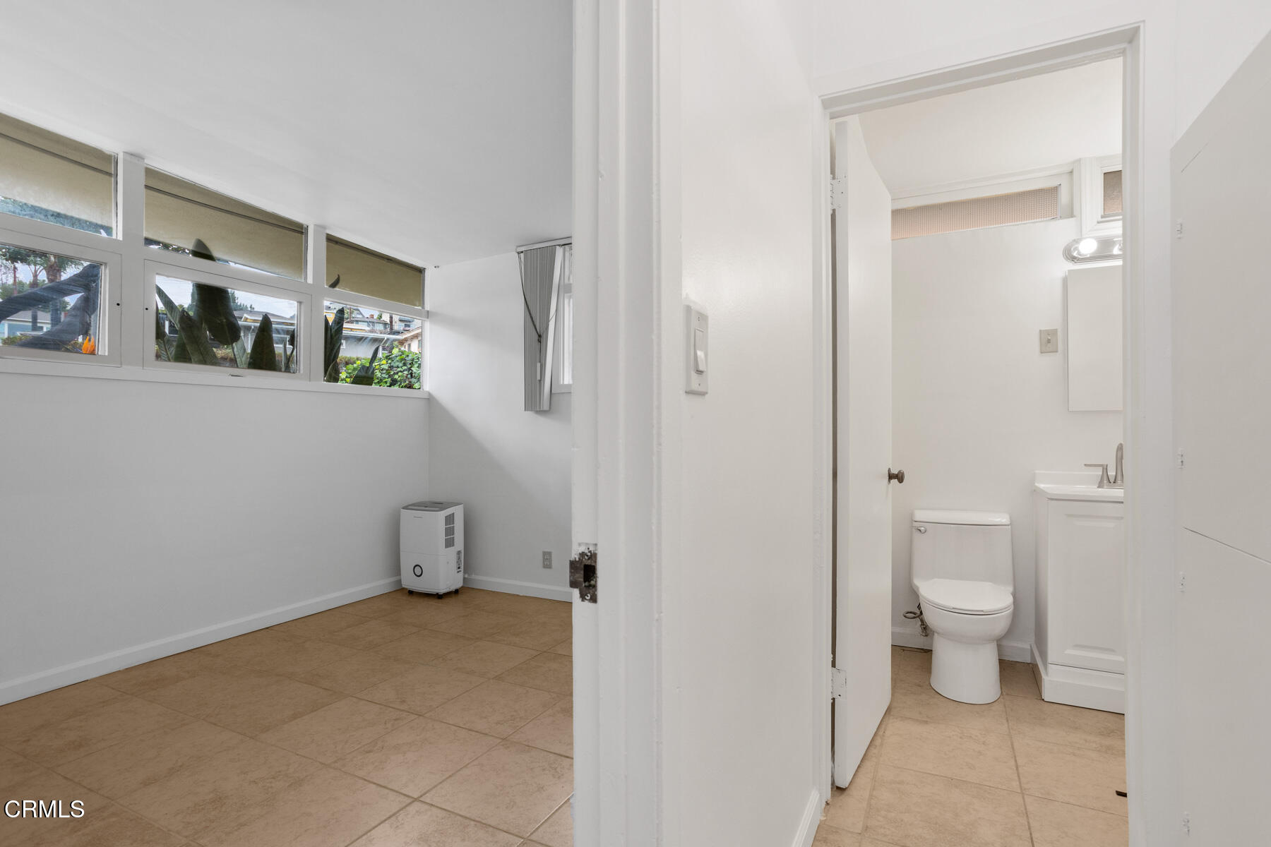 54 Avenue 64 Pasadena, CA 91105 - Photo 18 of 24 a bathroom with a toilet and a view of bathroom
