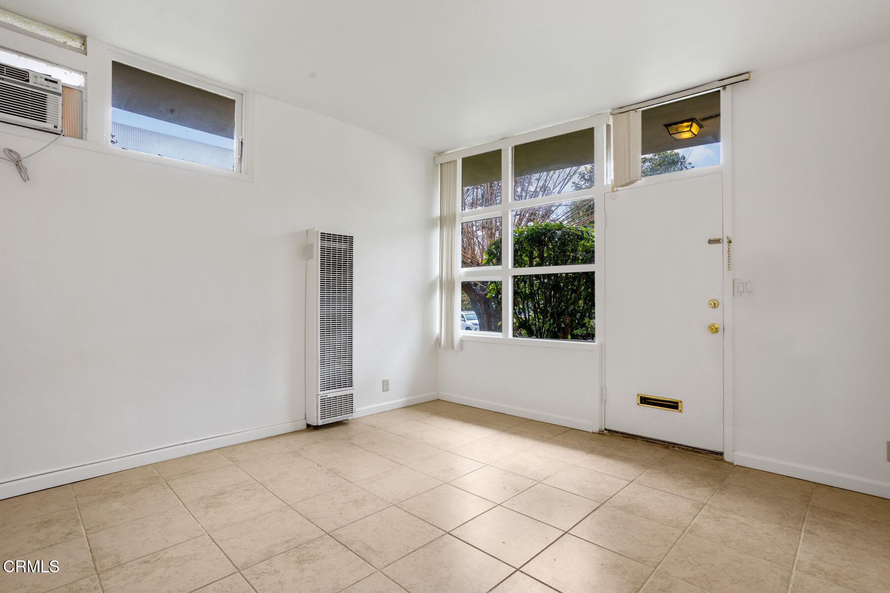 54 Avenue 64 Pasadena, CA 91105 - Photo 9 of 24 a view of an empty room with a window