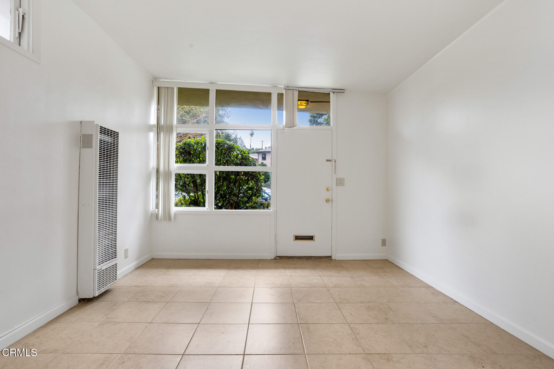 54 Avenue 64 Pasadena, CA 91105 - Photo 10 of 24 a view of an empty room with a window