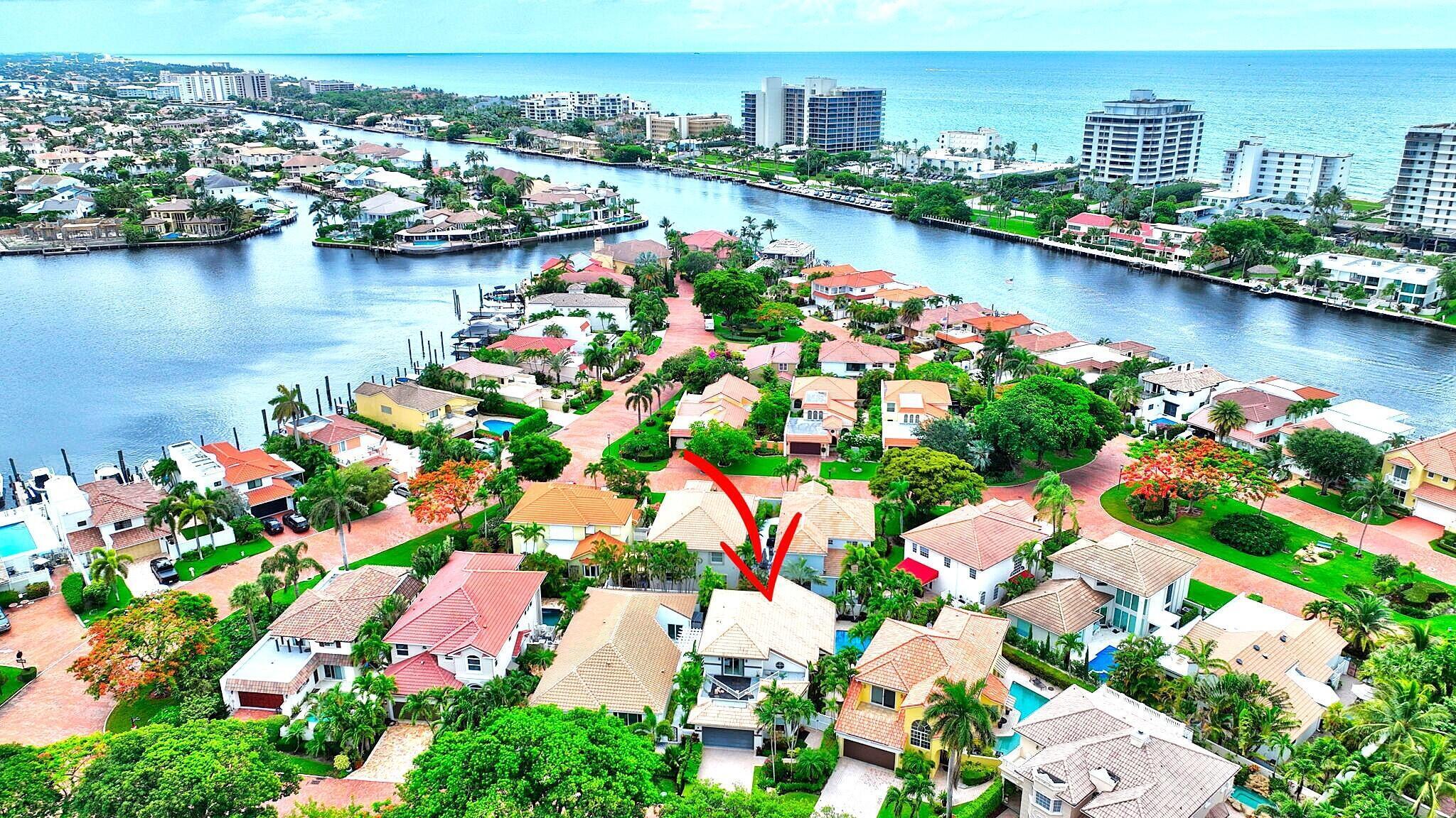 3567 Commodore Circle Delray Beach, FL 33483 - Photo 57 of 76 a city view with large lake and houses in the back