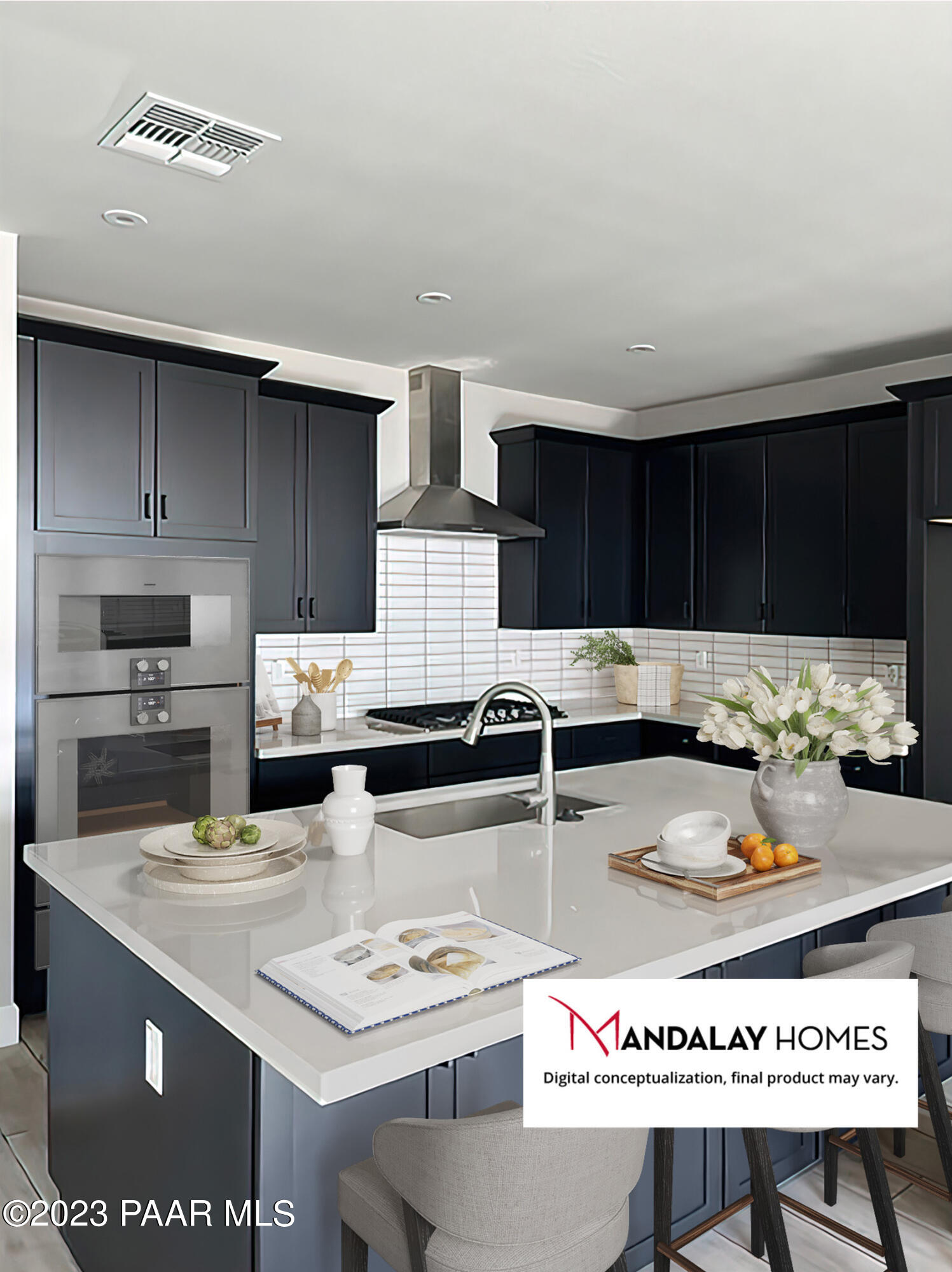5707 East Killen Loop Prescott Valley, AZ 86314 - Photo 8 of 28 a kitchen with stainless steel appliances kitchen island granite countertop a sink dishwasher stove and cabinets with wooden floor