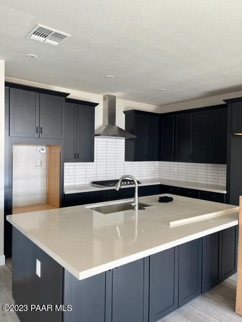 5707 East Killen Loop Prescott Valley, AZ 86314 - Photo 9 of 28 a kitchen with stainless steel appliances a sink a stove and cabinets