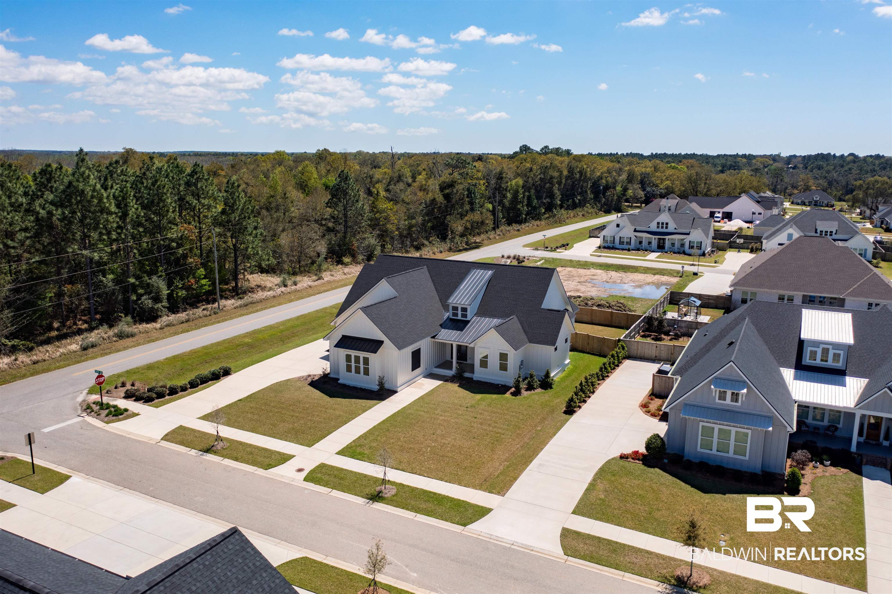 10970 Turin Avenue Fairhope, AL 36532 - Photo 49 of 61 Aerial view with a residential view and a forest view