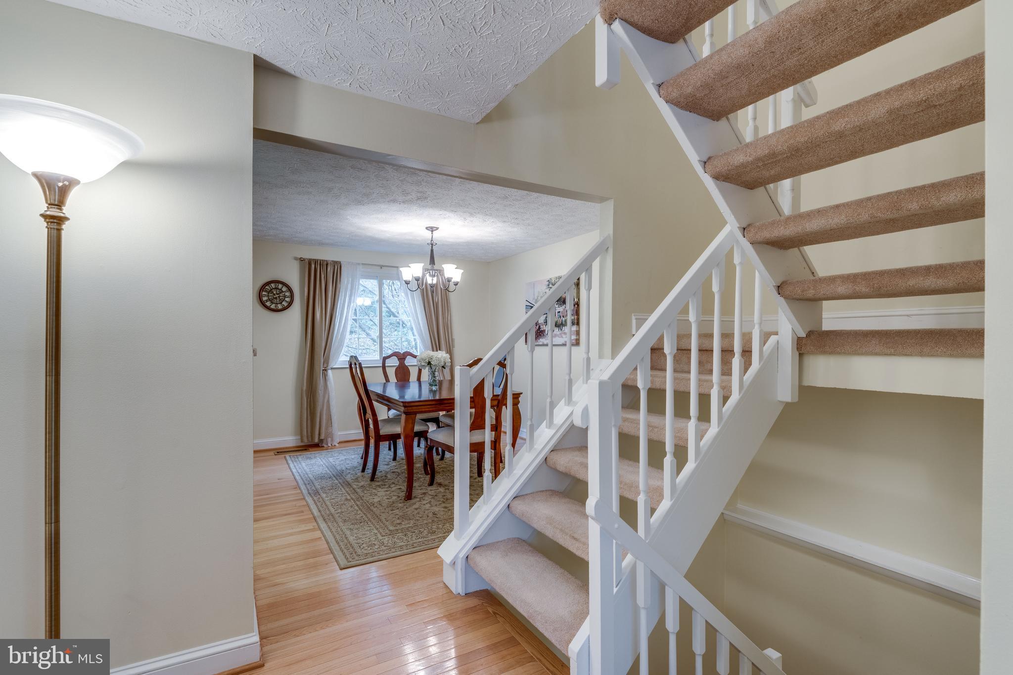1600 Barnstead Drive Reston, VA 20194 - Photo 12 of 37 Open staircase with display shelf for pictures