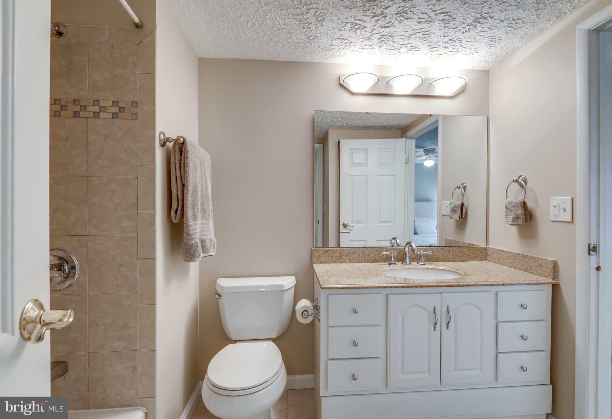 1600 Barnstead Drive Reston, VA 20194 - Photo 18 of 37 Remodeled bathroom with granite top vanity