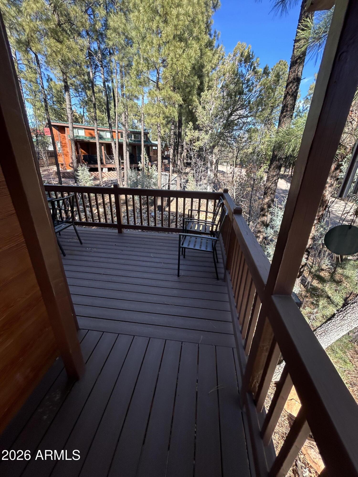 4020 South Elk Trot Loop Show Low, AZ 85901 - Photo 4 of 33 a view of a balcony with chairs