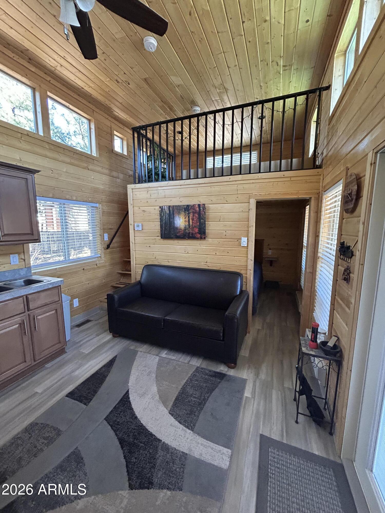 4020 South Elk Trot Loop Show Low, AZ 85901 - Photo 8 of 33 a bedroom with furniture and a window