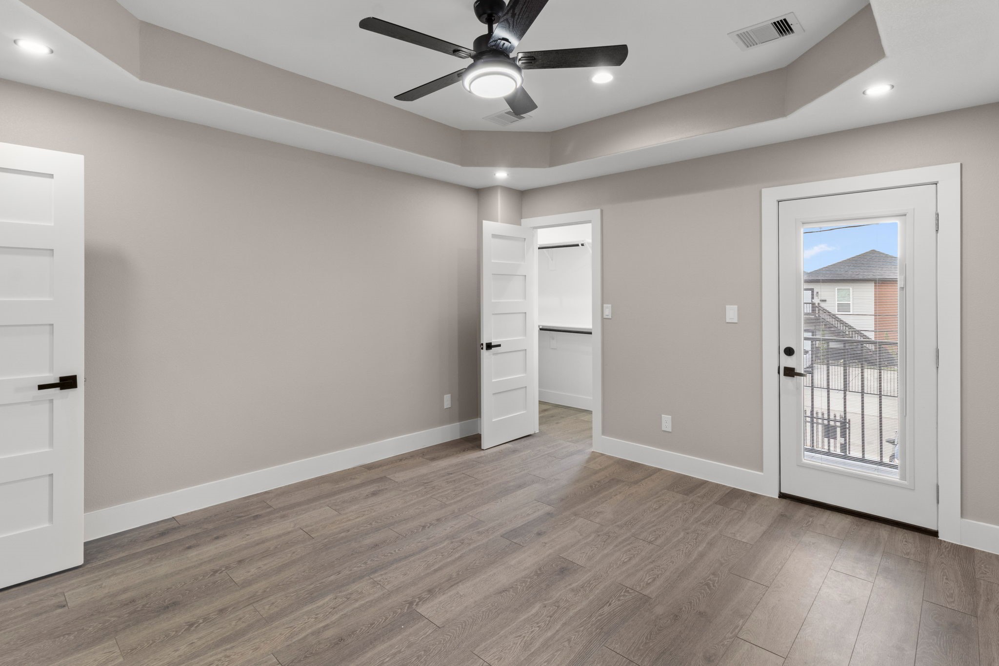7925 Colonial Lane Houston, TX 77051 - Photo 16 of 31 wooden floor in an empty room with a window