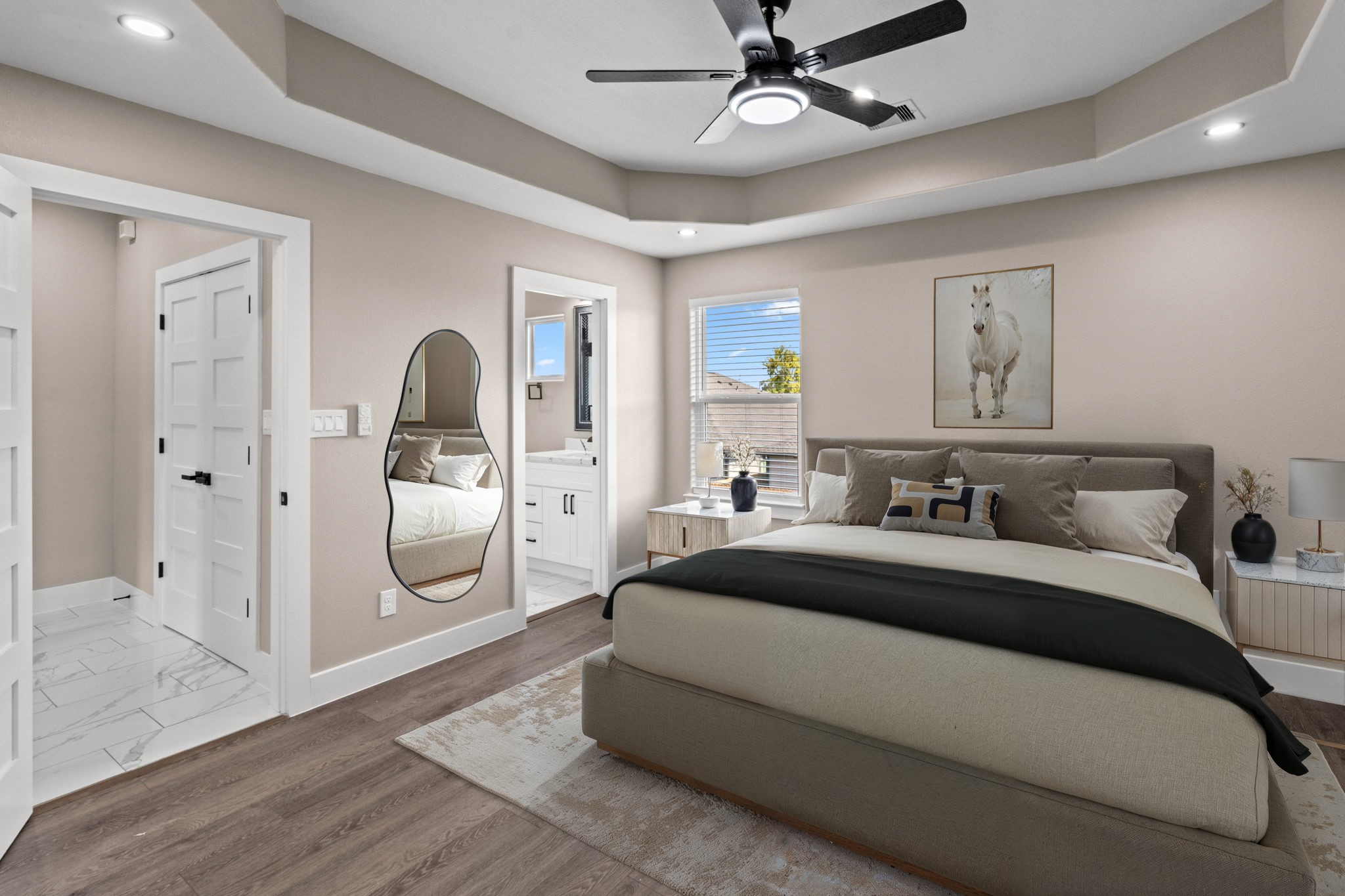 7925 Colonial Lane Houston, TX 77051 - Photo 22 of 31 a bedroom with a large bed and a chandelier