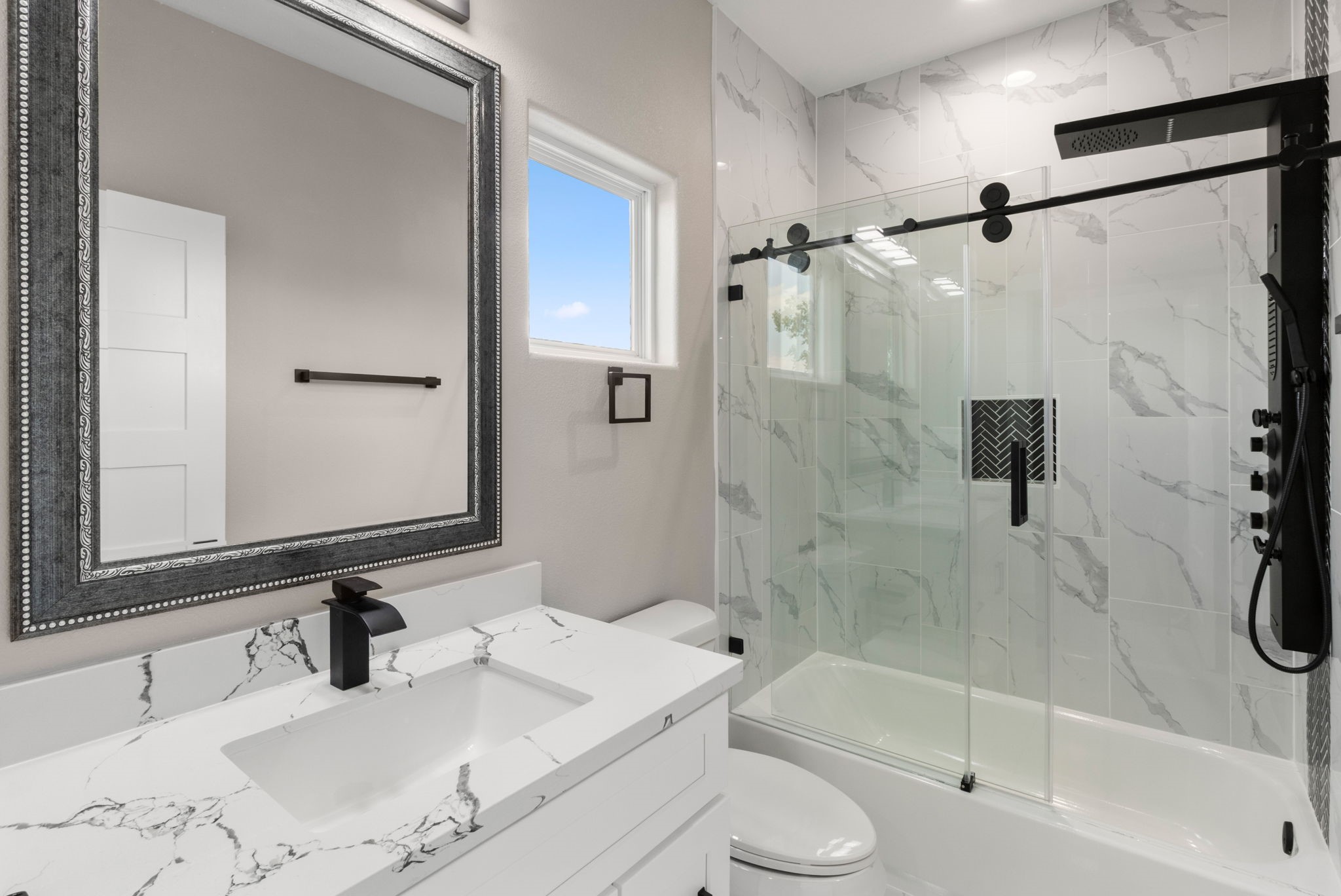 7925 Colonial Lane Houston, TX 77051 - Photo 26 of 31 a bathroom with a granite countertop sink toilet and shower