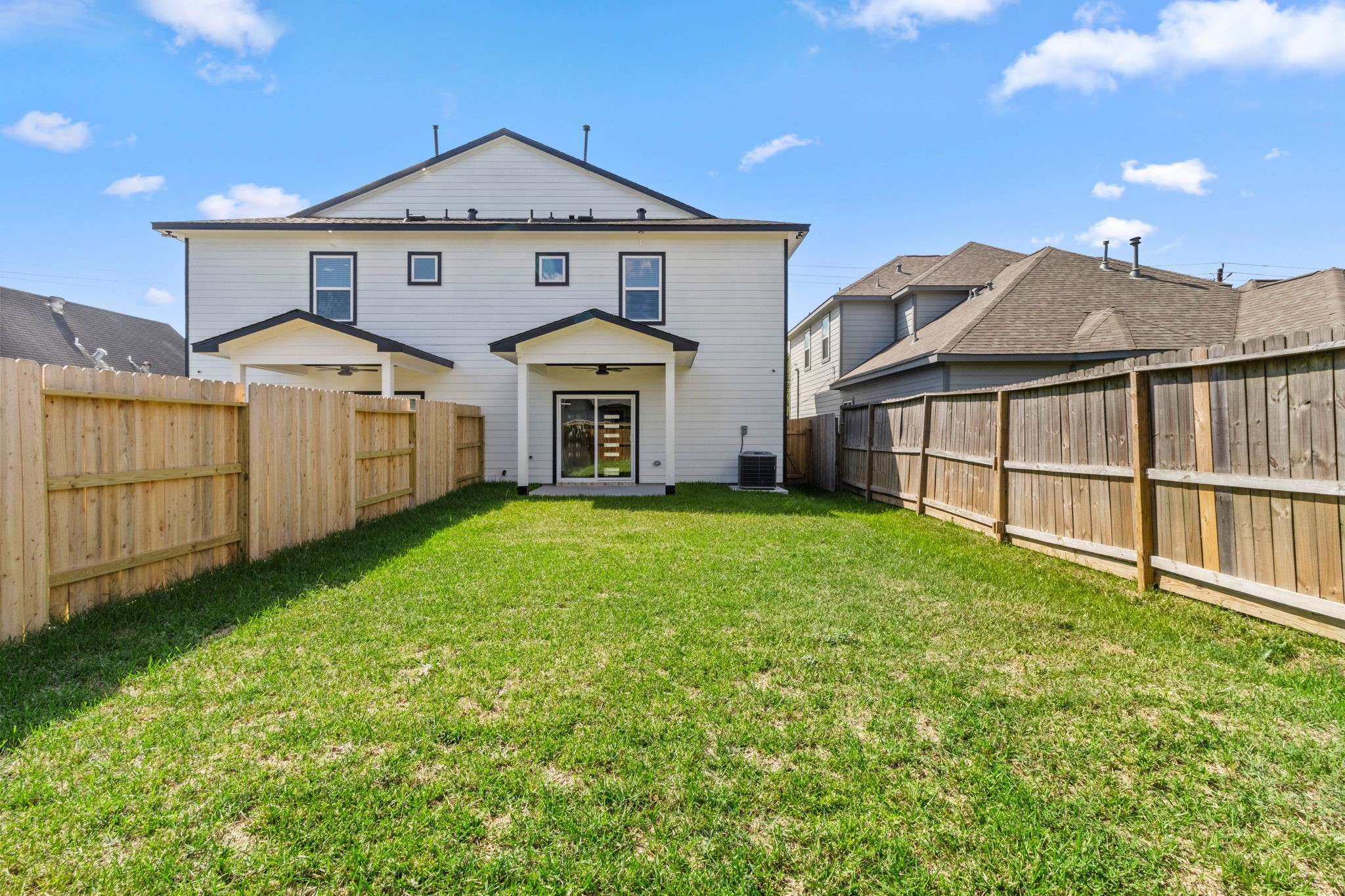 7925 Colonial Lane Houston, TX 77051 - Photo 29 of 31 a front view of a house with a yard