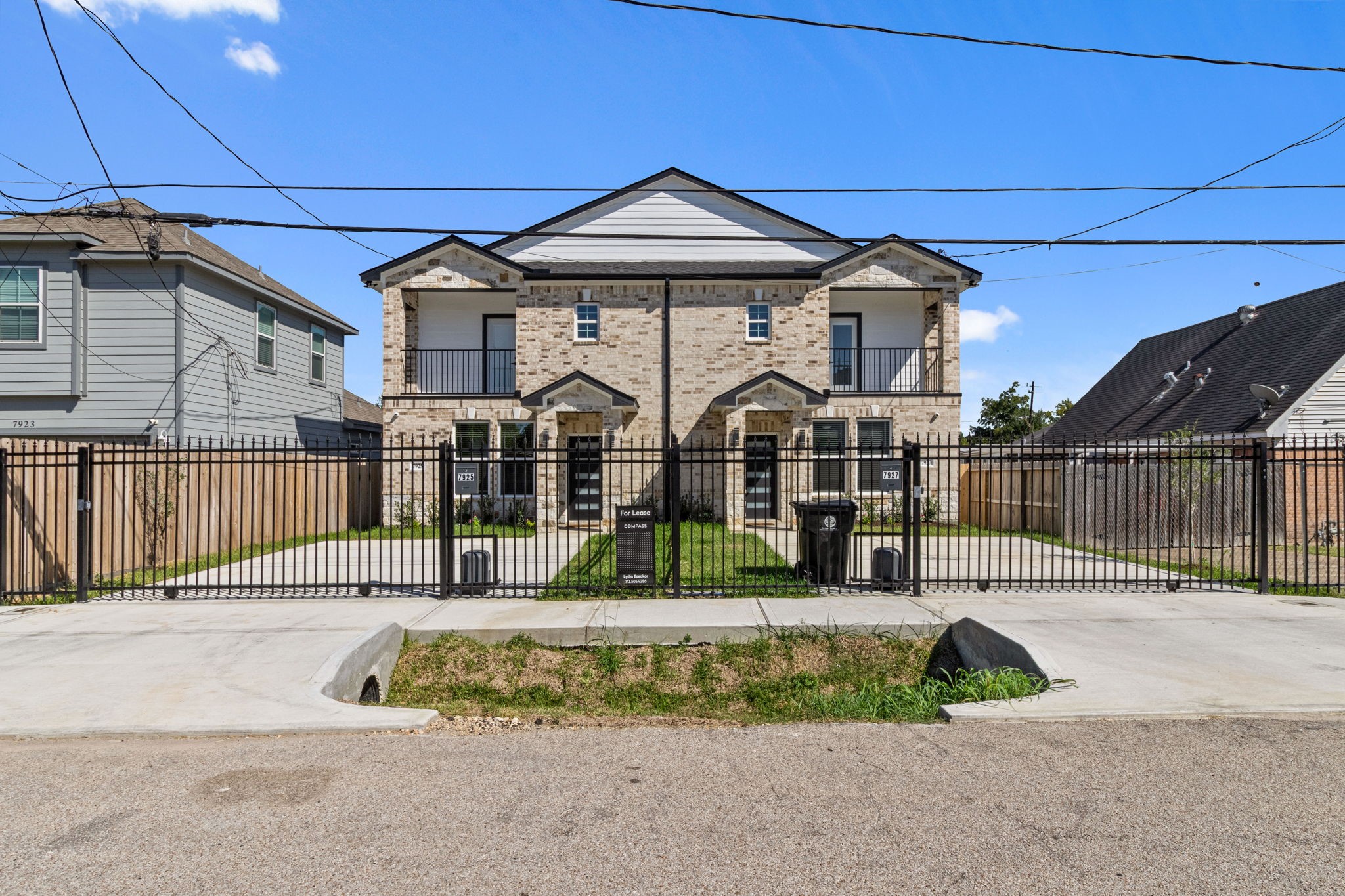 7925 Colonial Lane Houston, TX 77051 - Photo 31 of 31 a front view of a house with a garden