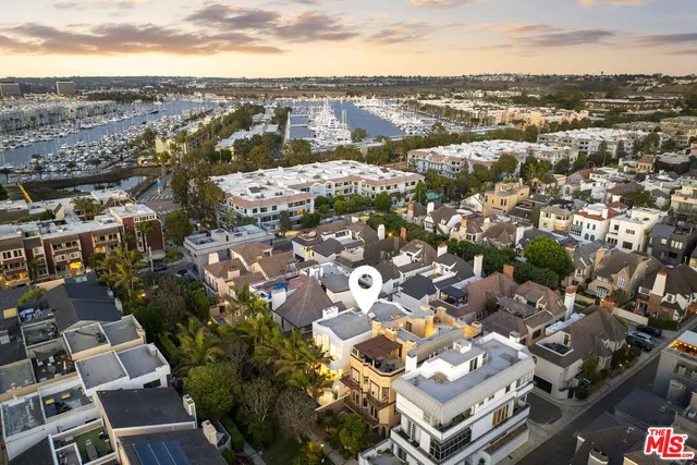 an aerial view of a city with lots of residential buildings