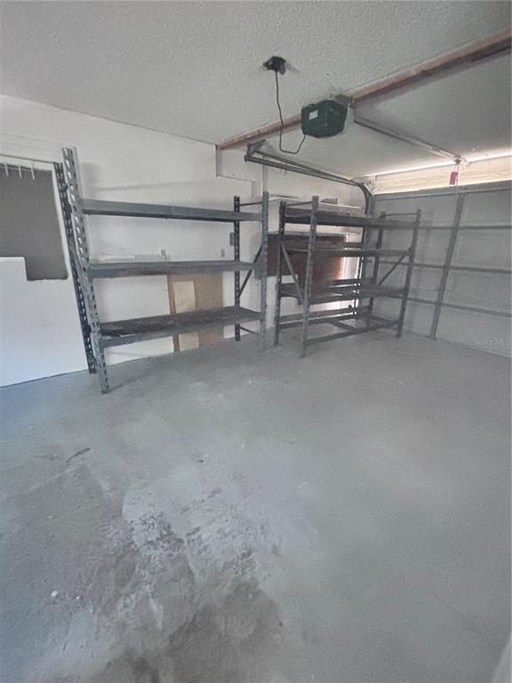 11806 Southeast 72nd Terrace Road Belleview, FL 34420 - Photo 12 of 13 a view of a garage room