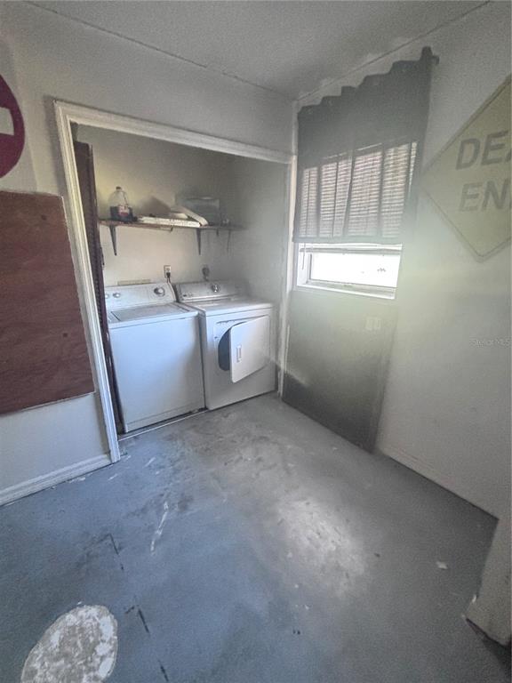 11806 Southeast 72nd Terrace Road Belleview, FL 34420 - Photo 13 of 13 a room with storage and utility