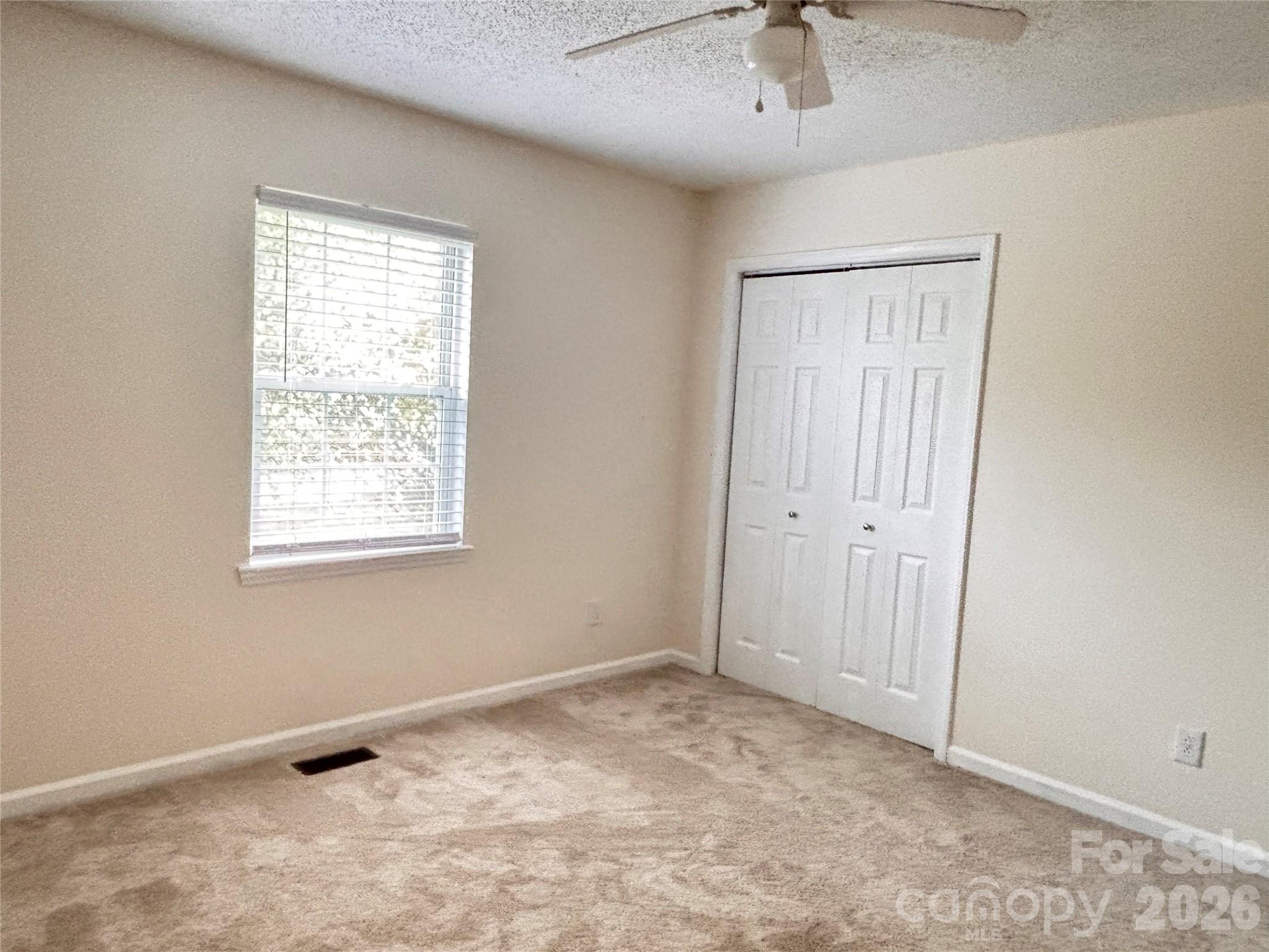 5164 Ralph Winchester Road Lenoir, NC 28645 - Photo 10 of 20 a view of an empty room with a window