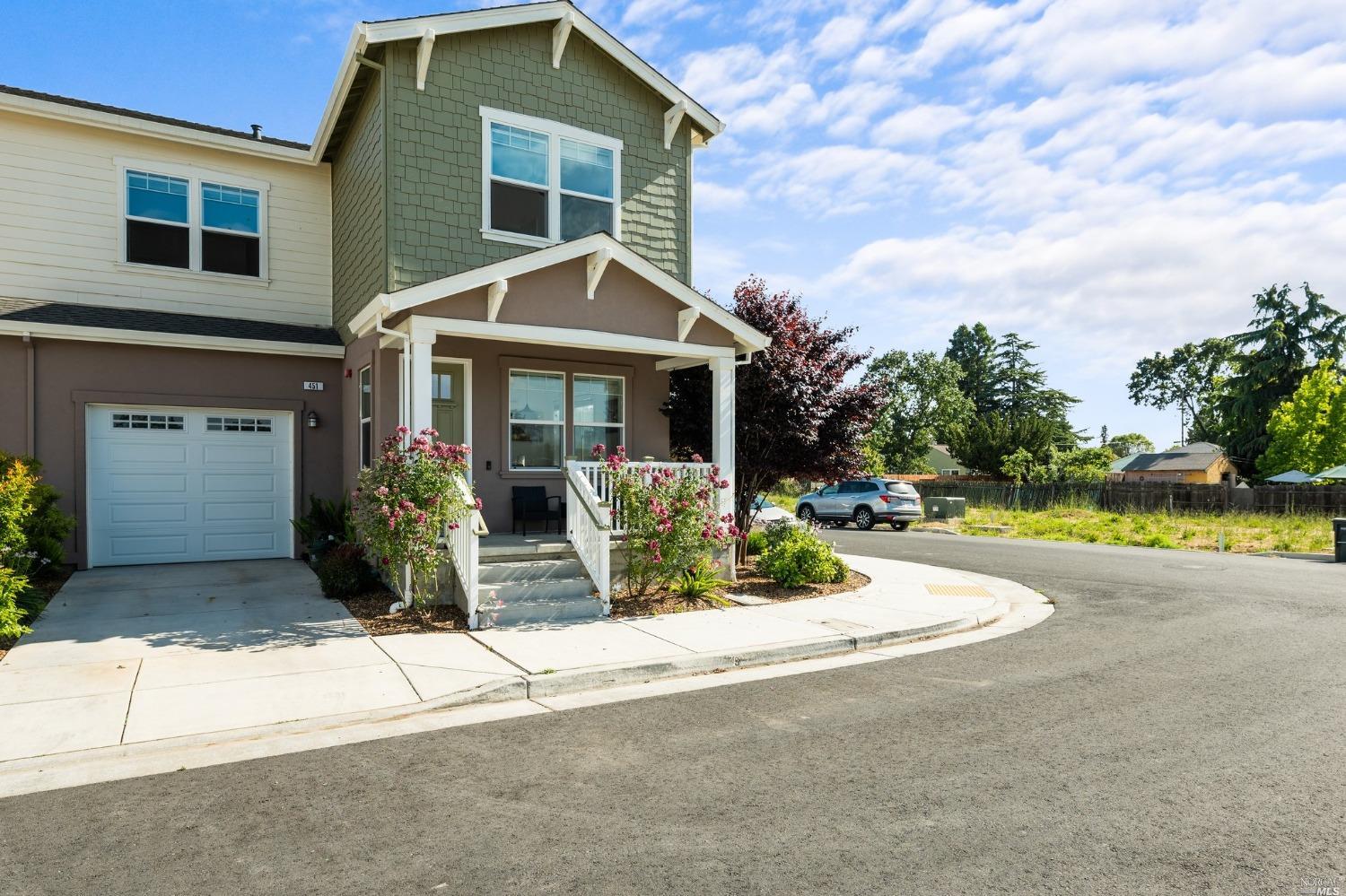 451 Pedrigal Place Santa Rosa, CA 95407 - Photo 1 of 1 a front view of a house with a yard and potted plants