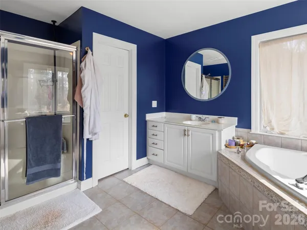 a very nice looking room with a large window and a couch