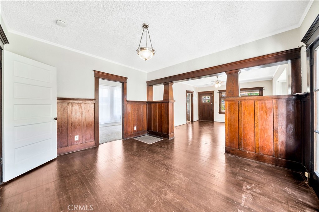 339 South Orange Street Orange, CA 92866 - Photo 13 of 52 a view of a hallway with wooden floors and stairs
