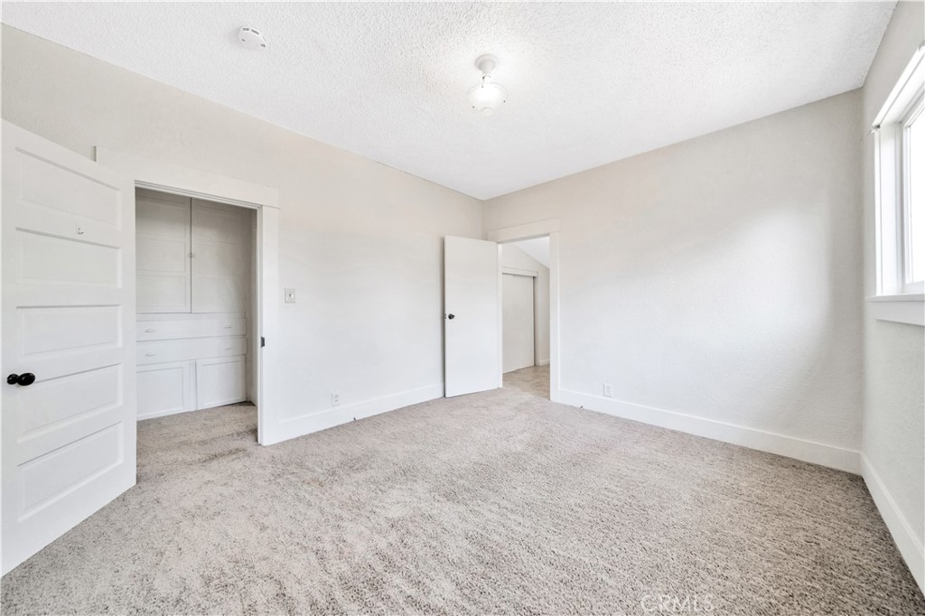 339 South Orange Street Orange, CA 92866 - Photo 23 of 52 an empty room with an entryway