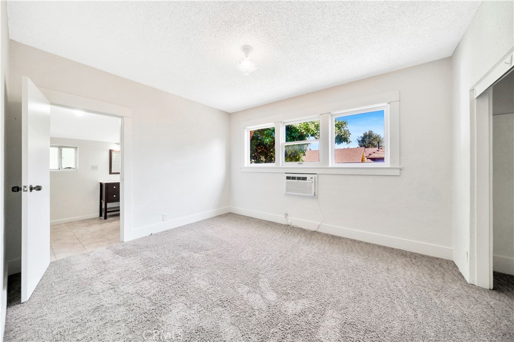 339 South Orange Street Orange, CA 92866 - Photo 24 of 52 an empty room with windows