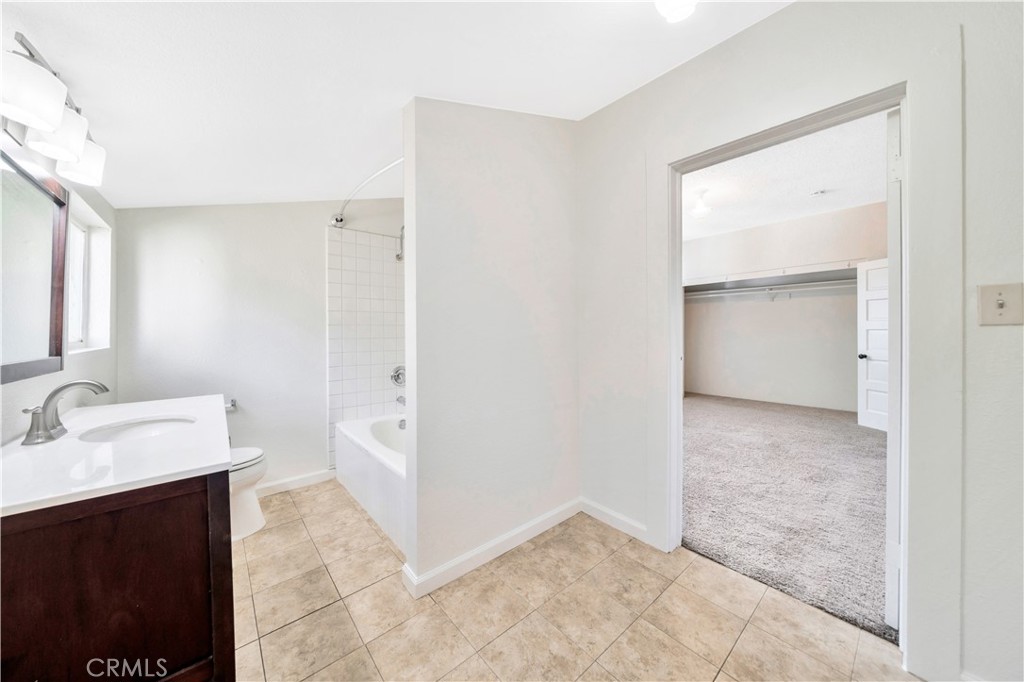 339 South Orange Street Orange, CA 92866 - Photo 25 of 52 a bathroom with a sink and a mirror