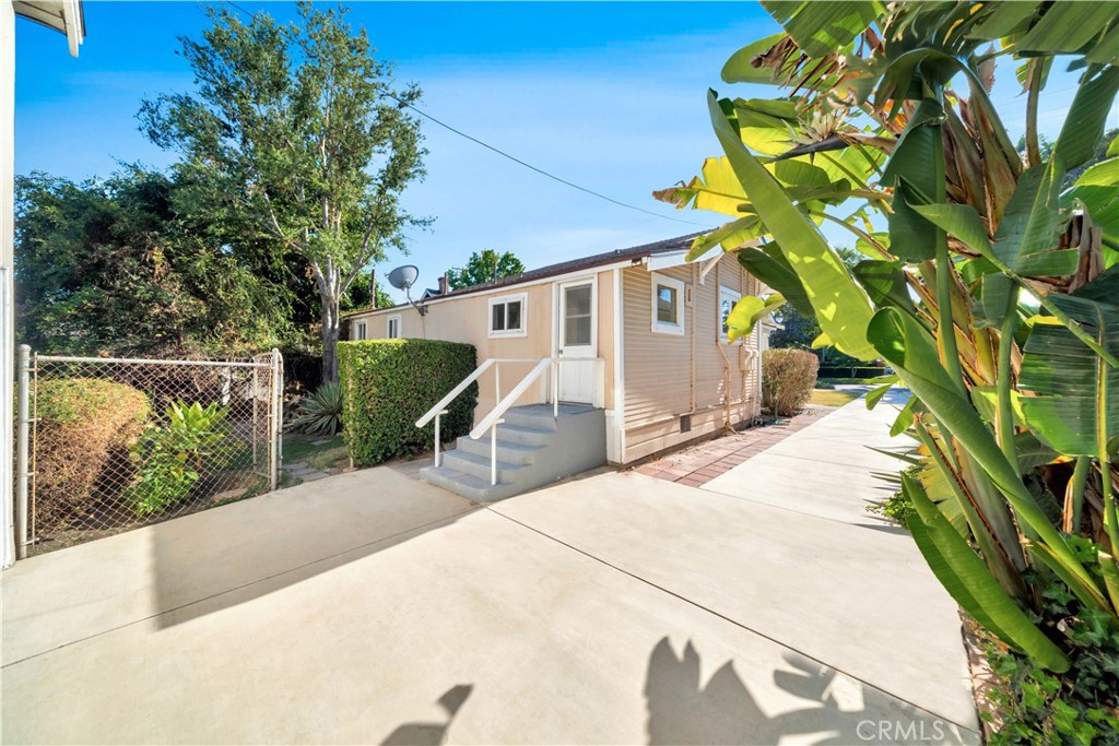 339 South Orange Street Orange, CA 92866 - Photo 27 of 52 a view of a house with a backyard