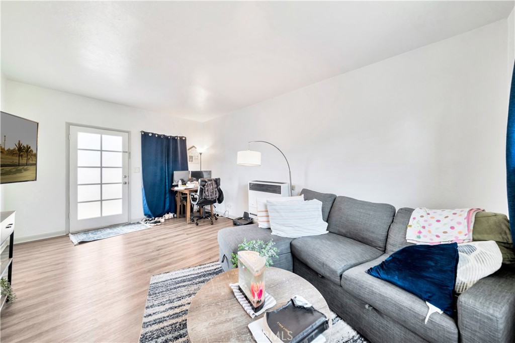 339 South Orange Street Orange, CA 92866 - Photo 33 of 52 a living room with furniture and wooden floor