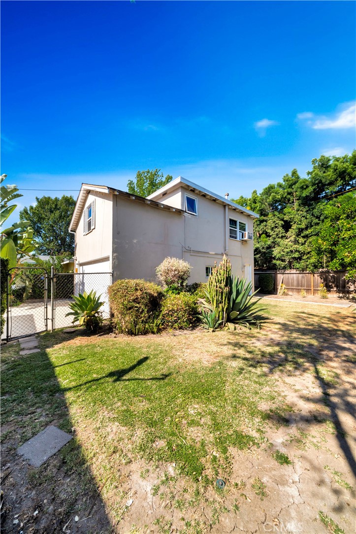 339 South Orange Street Orange, CA 92866 - Photo 41 of 52 a view of a house with a yard