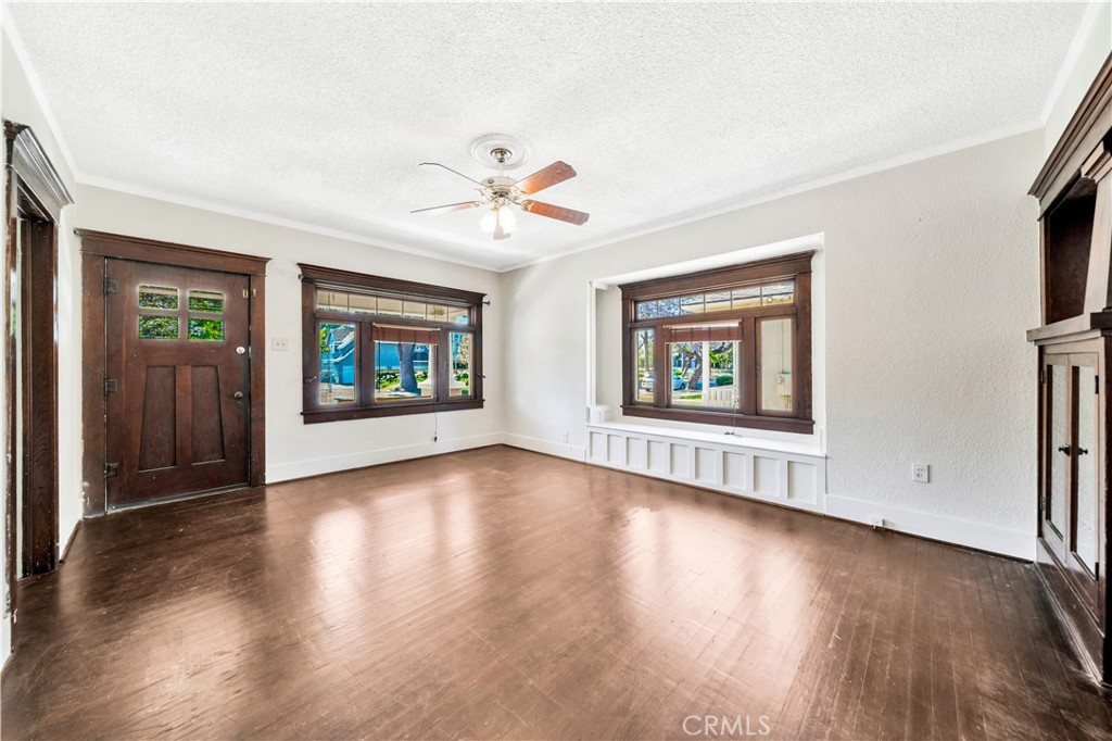 339 South Orange Street Orange, CA 92866 - Photo 9 of 52 wooden floor in an empty room with a window