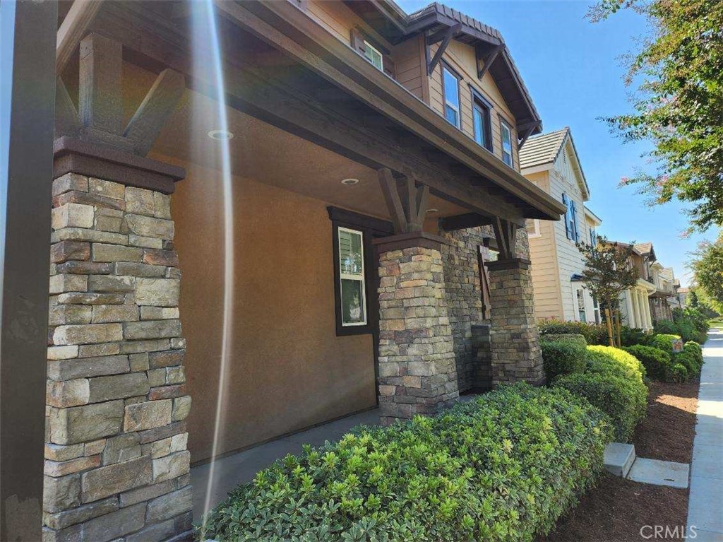 146 Violet Bloom Irvine, CA 92618 - Photo 2 of 25 a view of a wooden door of the house