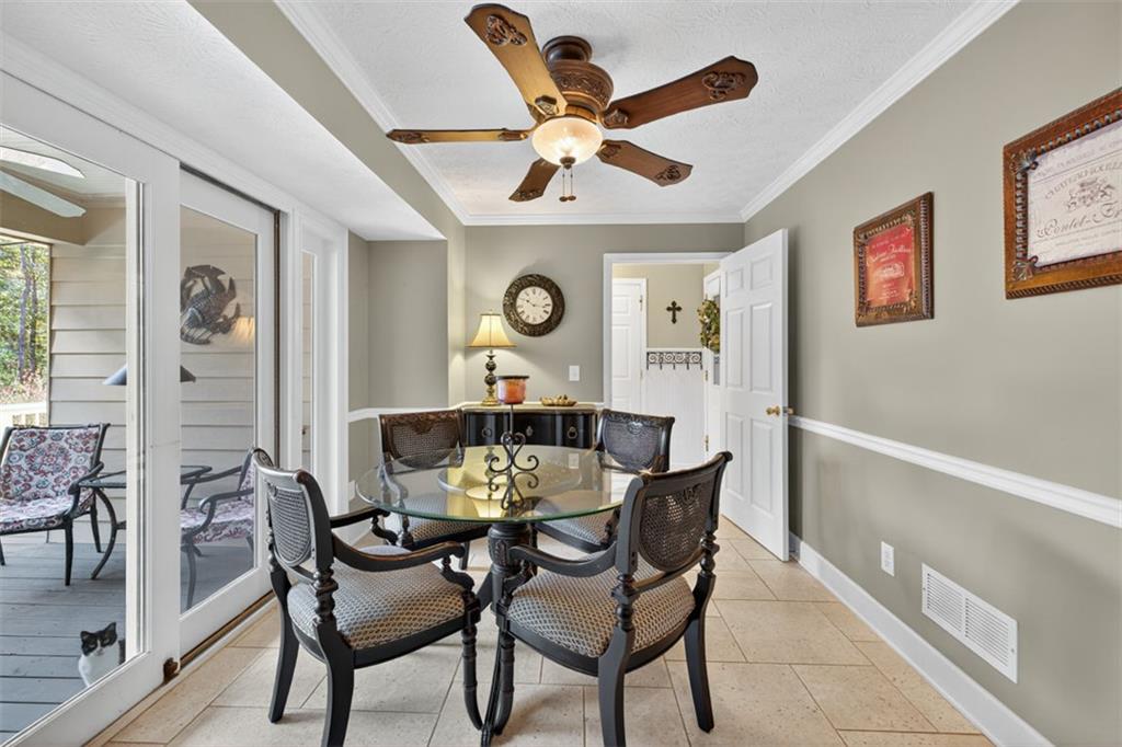 2150 Oglesby Bridge Road Southwest Conyers, GA 30094 - Photo 22 of 113 a dining room with furniture and window