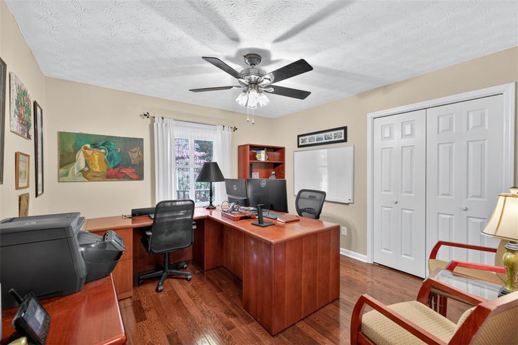 2150 Oglesby Bridge Road Southwest Conyers, GA 30094 - Photo 31 of 113 a view of a workspace with furniture and a window