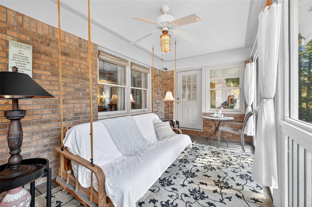 2150 Oglesby Bridge Road Southwest Conyers, GA 30094 - Photo 56 of 113 a living room with furniture and a window