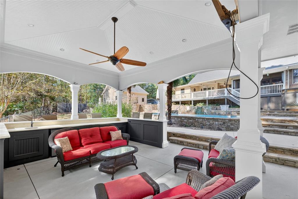 2150 Oglesby Bridge Road Southwest Conyers, GA 30094 - Photo 77 of 113 a living room with furniture a rug and a window