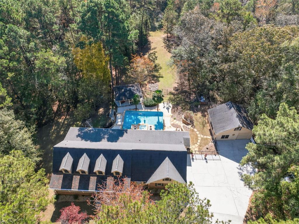 2150 Oglesby Bridge Road Southwest Conyers, GA 30094 - Photo 100 of 113 an aerial view of a house