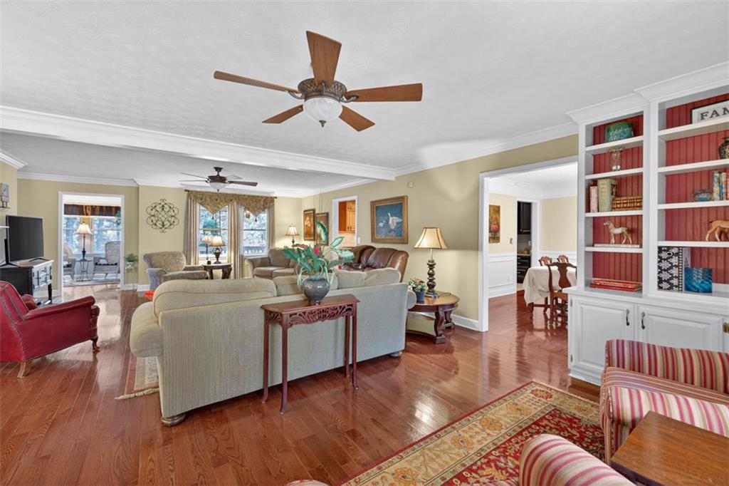 2150 Oglesby Bridge Road Southwest Conyers, GA 30094 - Photo 10 of 113 a living room with furniture and a large window