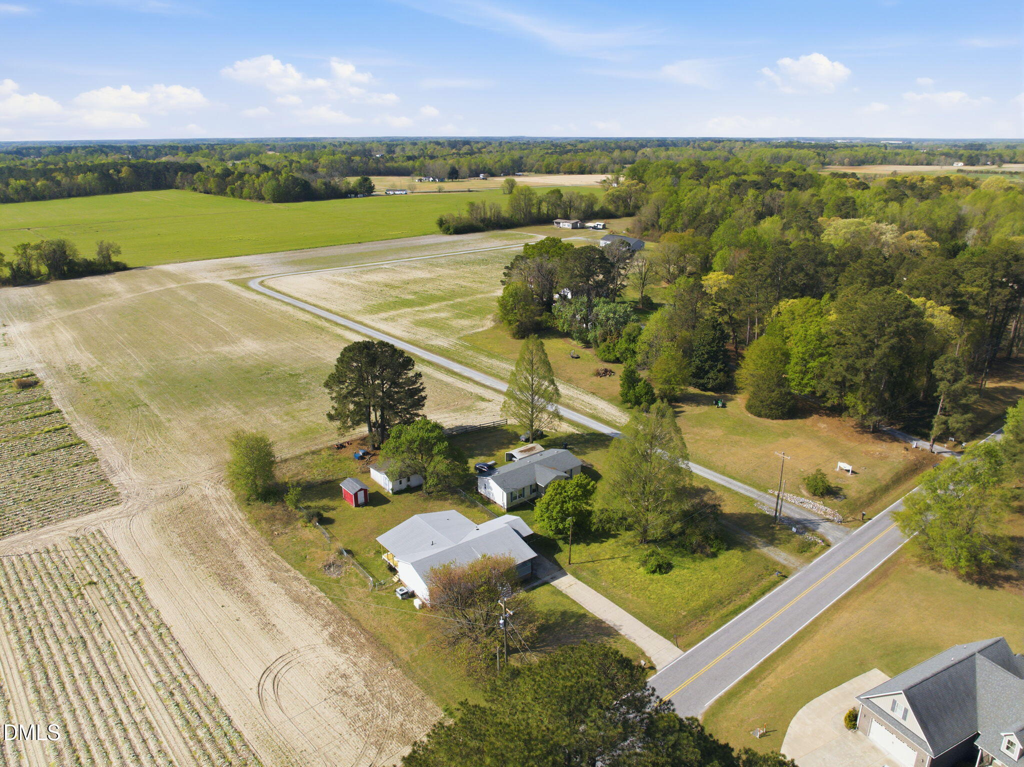 945 Old School Road Four Oaks, NC 27524 - Photo 6 of 37 an aerial view of a residential houses with outdoor space