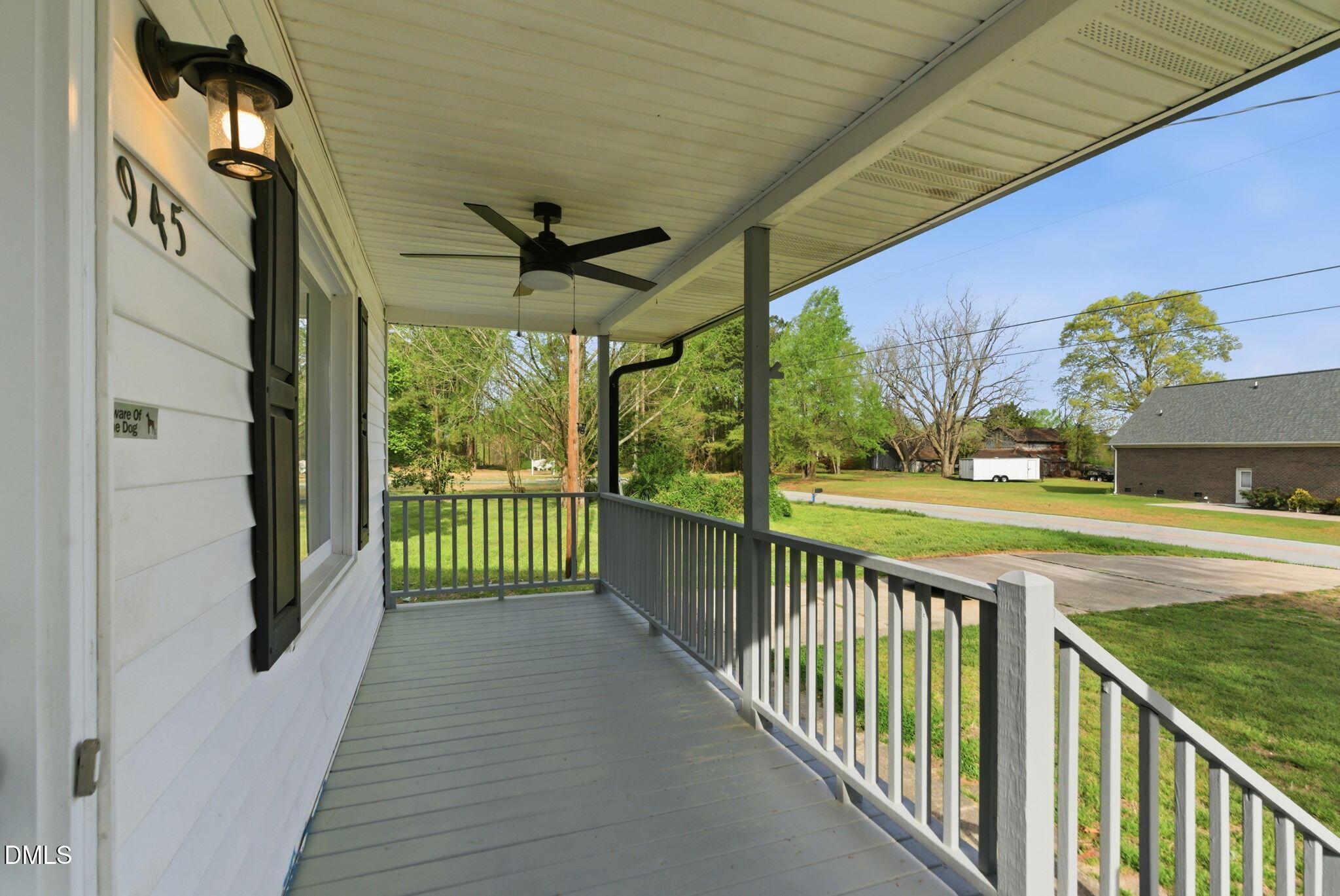 945 Old School Road Four Oaks, NC 27524 - Photo 2 of 37 a view of a porch