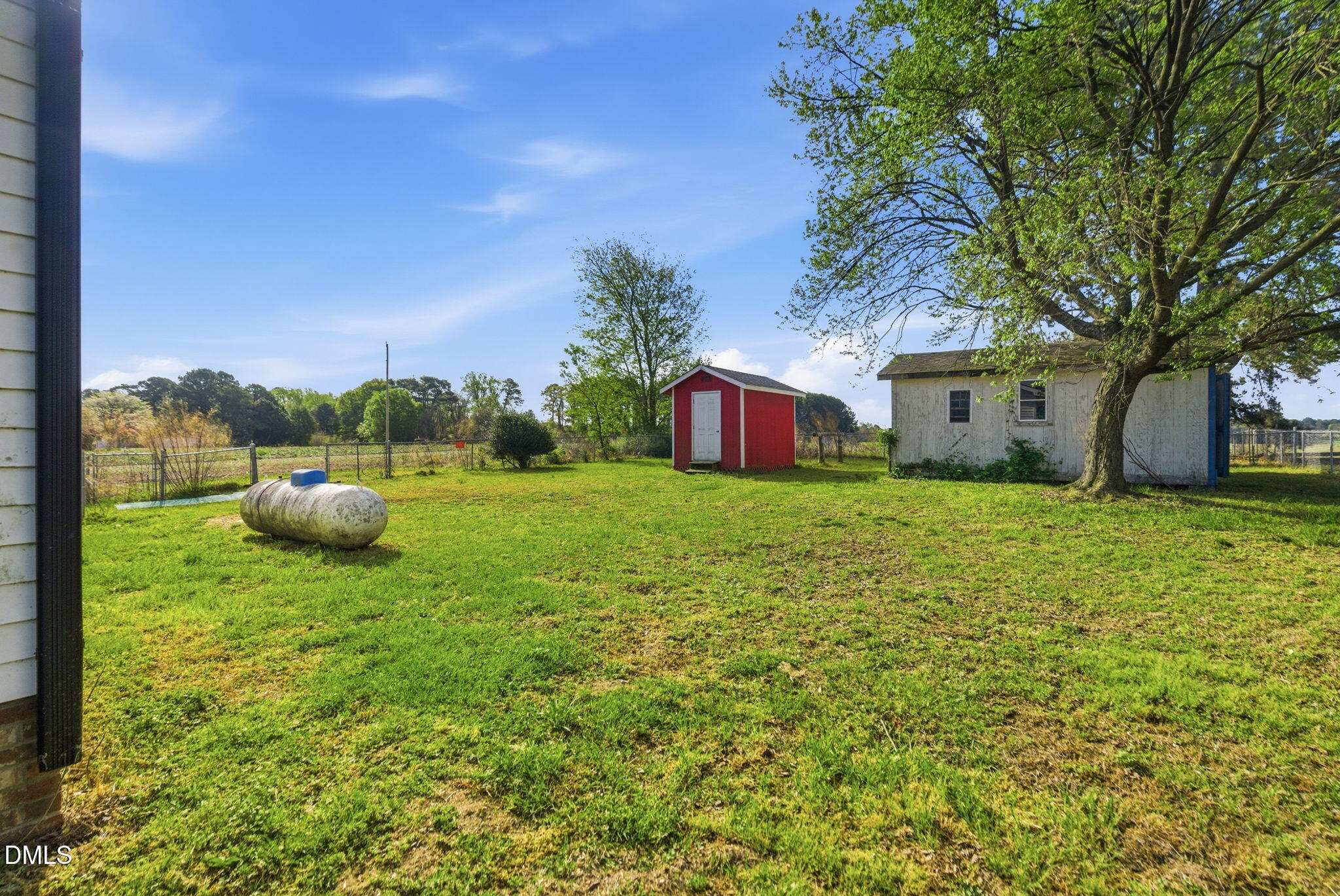 945 Old School Road Four Oaks, NC 27524 - Photo 27 of 37 a view of a garden with plants