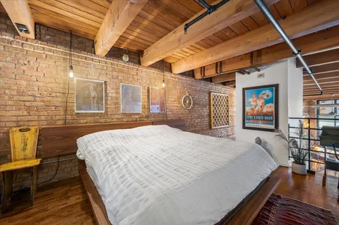 a room with furniture and a flat screen tv