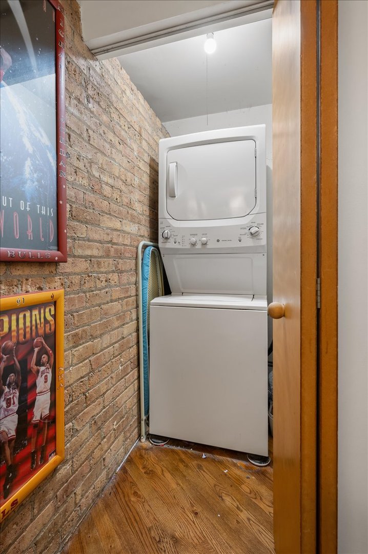 2161 North California Avenue, Unit 105 Chicago, IL 60647 - Photo 24 of 27 a utility room with washer and dryer