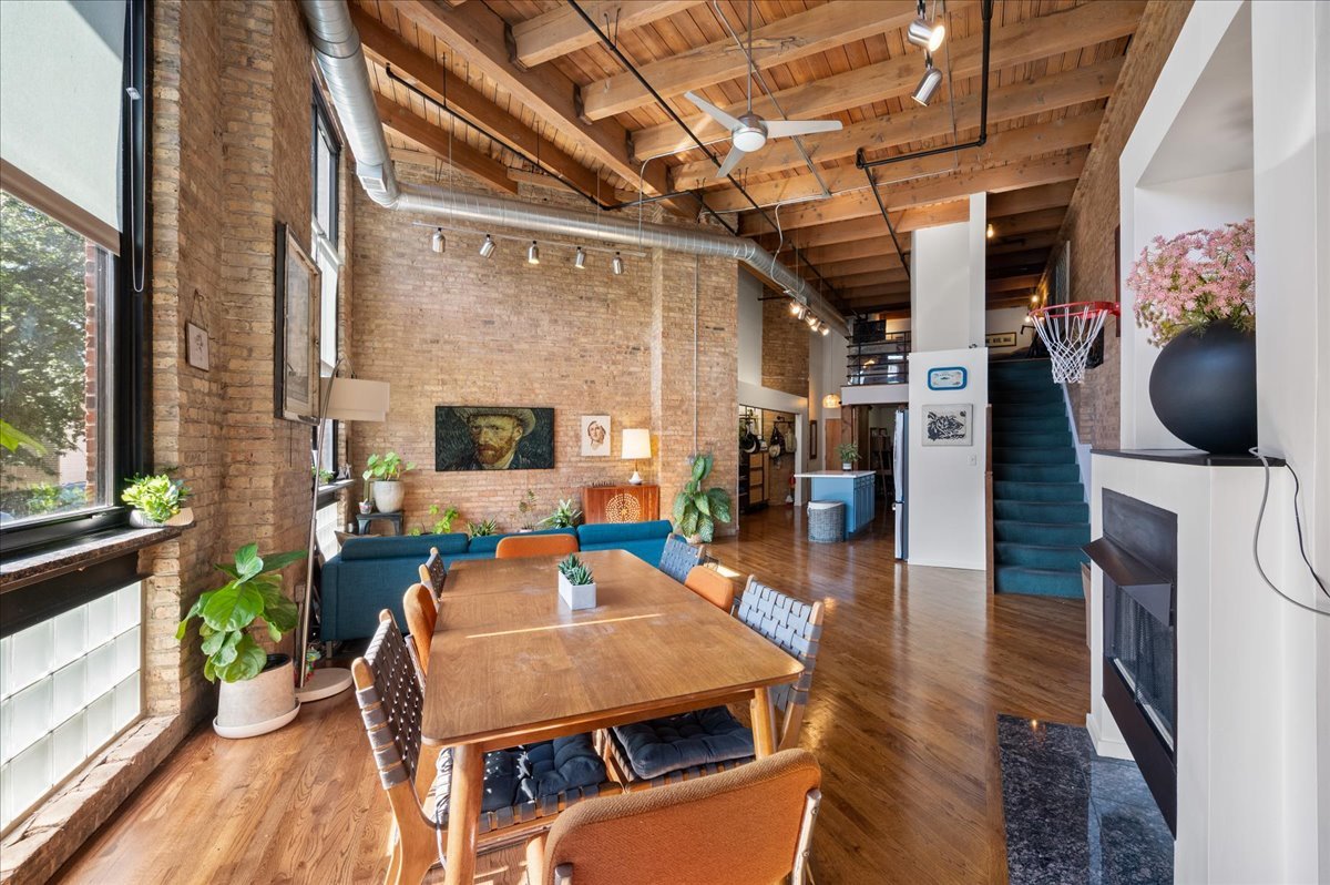 2161 North California Avenue, Unit 105 Chicago, IL 60647 - Photo 8 of 27 a outdoor living space with furniture and a fireplace