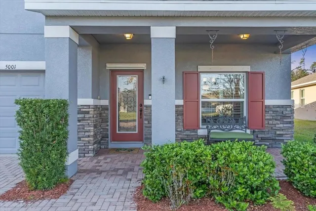 a view of entrance of house and yard