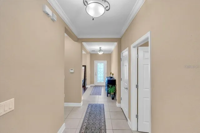 a view of a hallway with a furniture