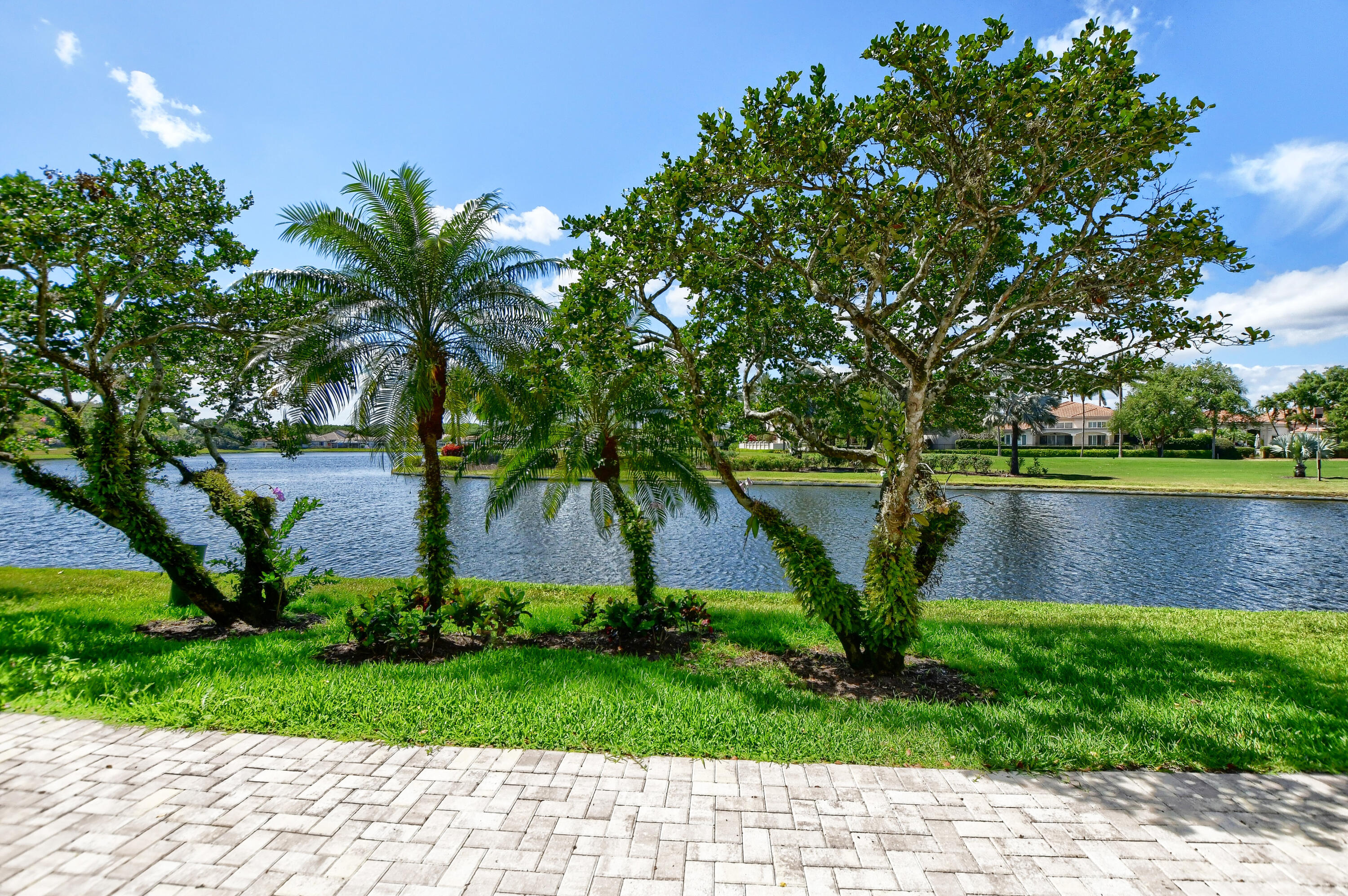 2461 Northwest 59th Street, Unit 701 Boca Raton, FL 33496 - Photo 34 of 62 OUTDOOR PATIO/LAKE VIEWS