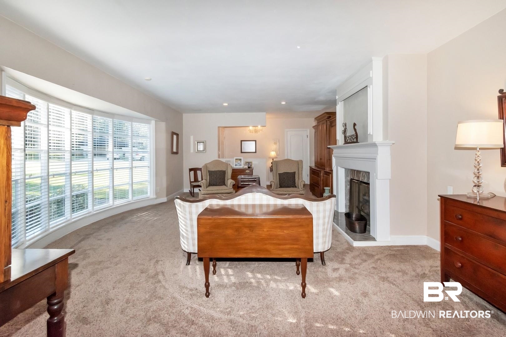 302 Springwood Drive East Mobile, AL 36608 - Photo 6 of 35 Carpeted living room with a fireplace